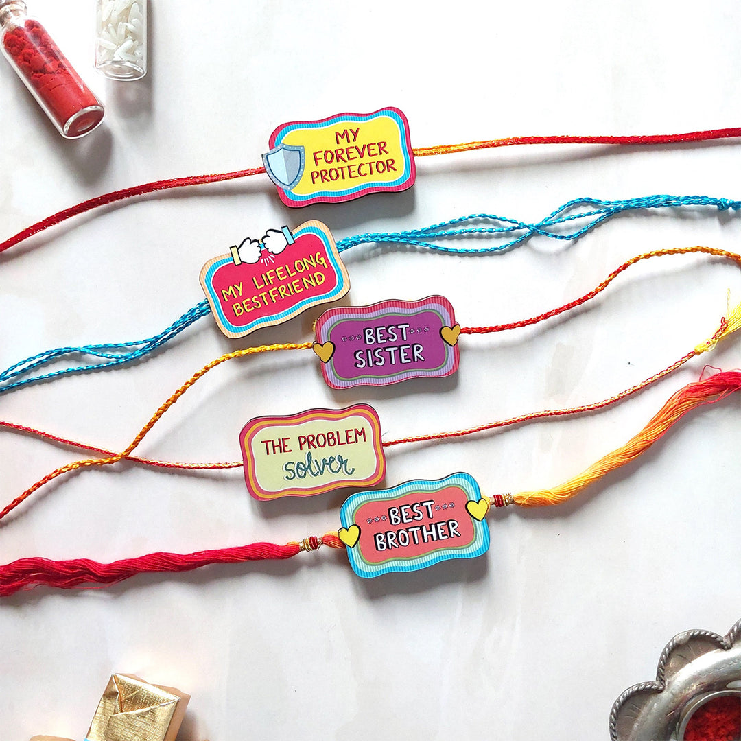 Glossy Printed Wooden Assorted Rakhi Combo With Kumkum Rice | Set of 5