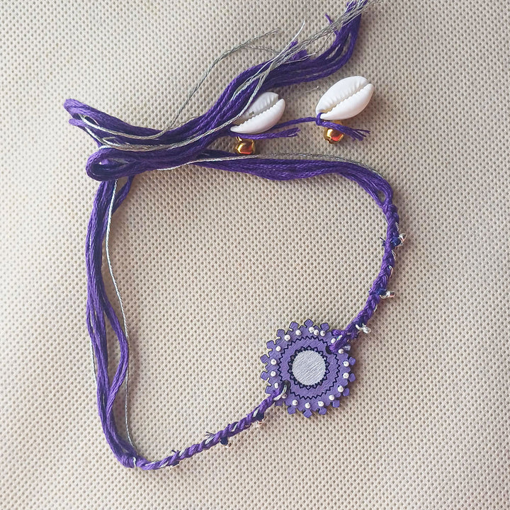 Handmade Puprle Ghungroo Shell And Beads Wooden Bhaiya Bhabhi Rakhi With Roli Chawal - Full Necklace Laid Flat