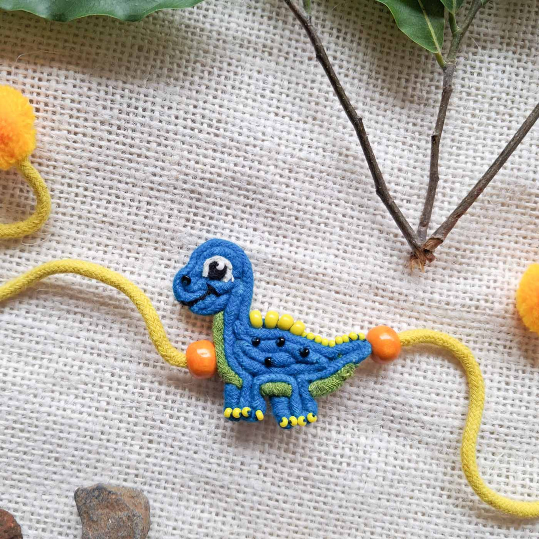 Handmade Doriwork Blue Dinosaur Kids Rakhi With Roli Chawal For Brother