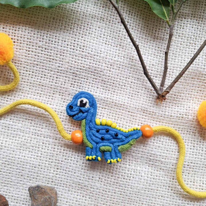 Handmade Doriwork Blue Dinosaur Kids Rakhi With Roli Chawal For Brother