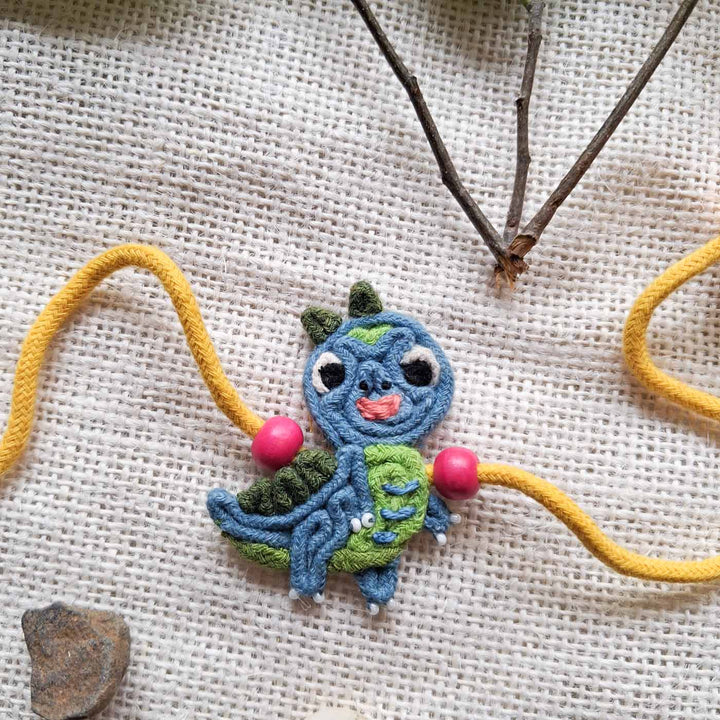 Handmade Doriwork Teal Dinosaur Kids Rakhi With Roli Chawal For Brother