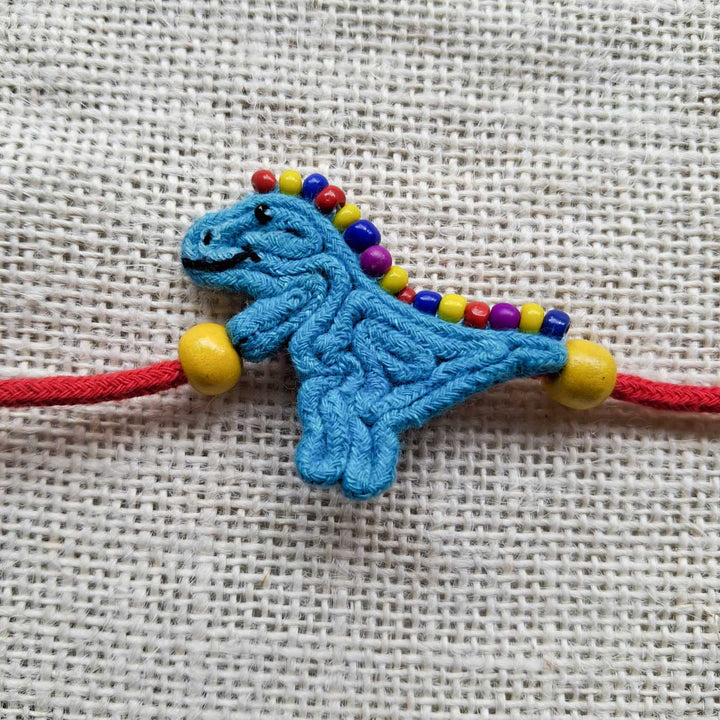Handmade Doriwork Playful Dinosaur Kids Rakhi With Roli Chawal For Brother