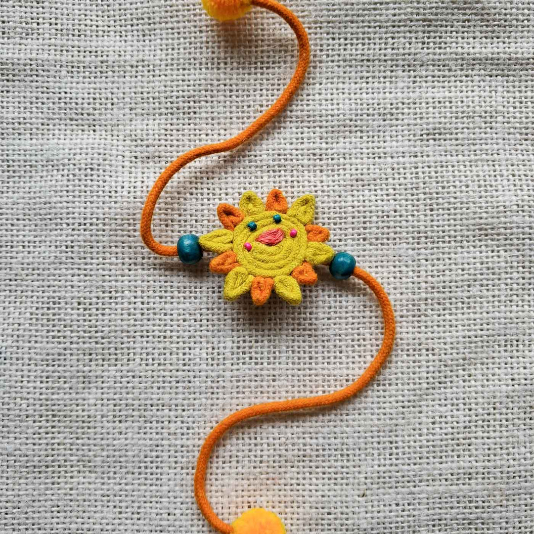 Handmade Doriwork Sunny Day Kids Rakhi With Roli Chawal For Brother