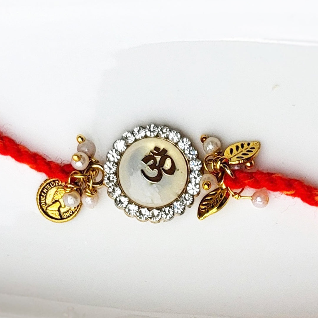 Handcrafted Brass-Cut Om White Stone Rakhi With Roli Chawal For Brother