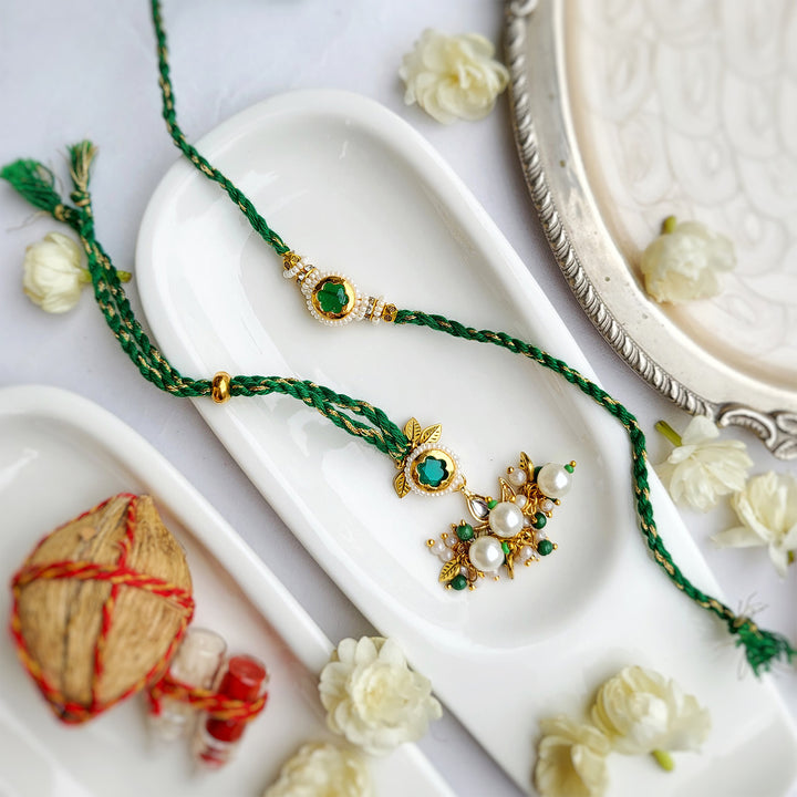 Handcrafted Jadau Kundan Emerald Green Bhai Rakhi with Indian Motif Bhabhi Cuff | Set of 2