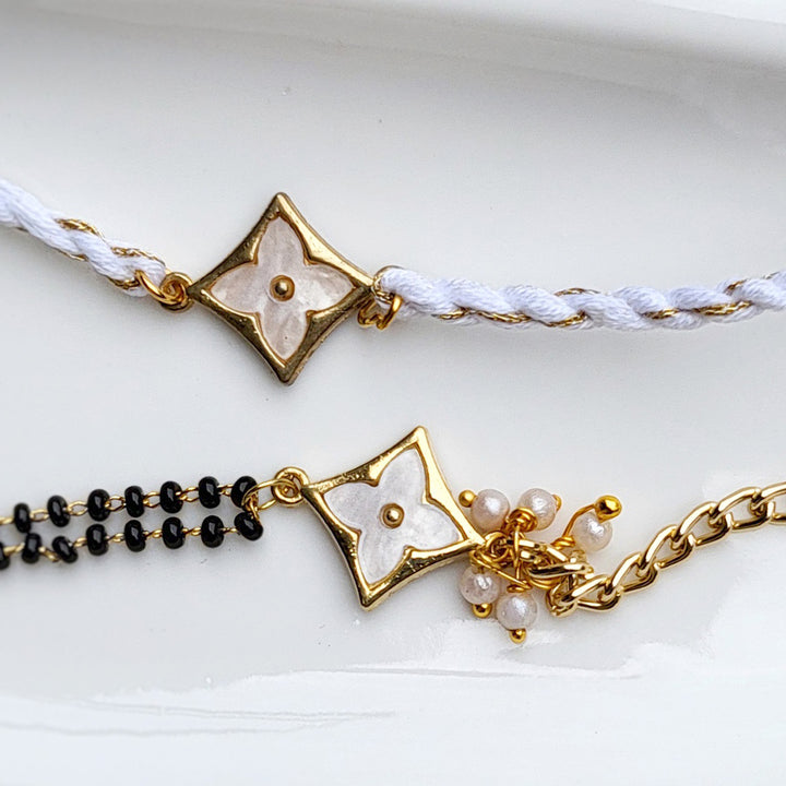 Handcrafted Brass Four Petal Flower Bhaiya Bhabhi Rakhi With Roli Chawal | Set of 2
