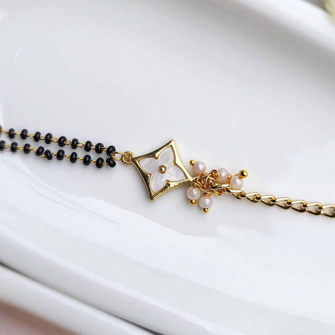 Handcrafted Brass Four Petal Flower Bhaiya Bhabhi Rakhi With Roli Chawal | Set of 2