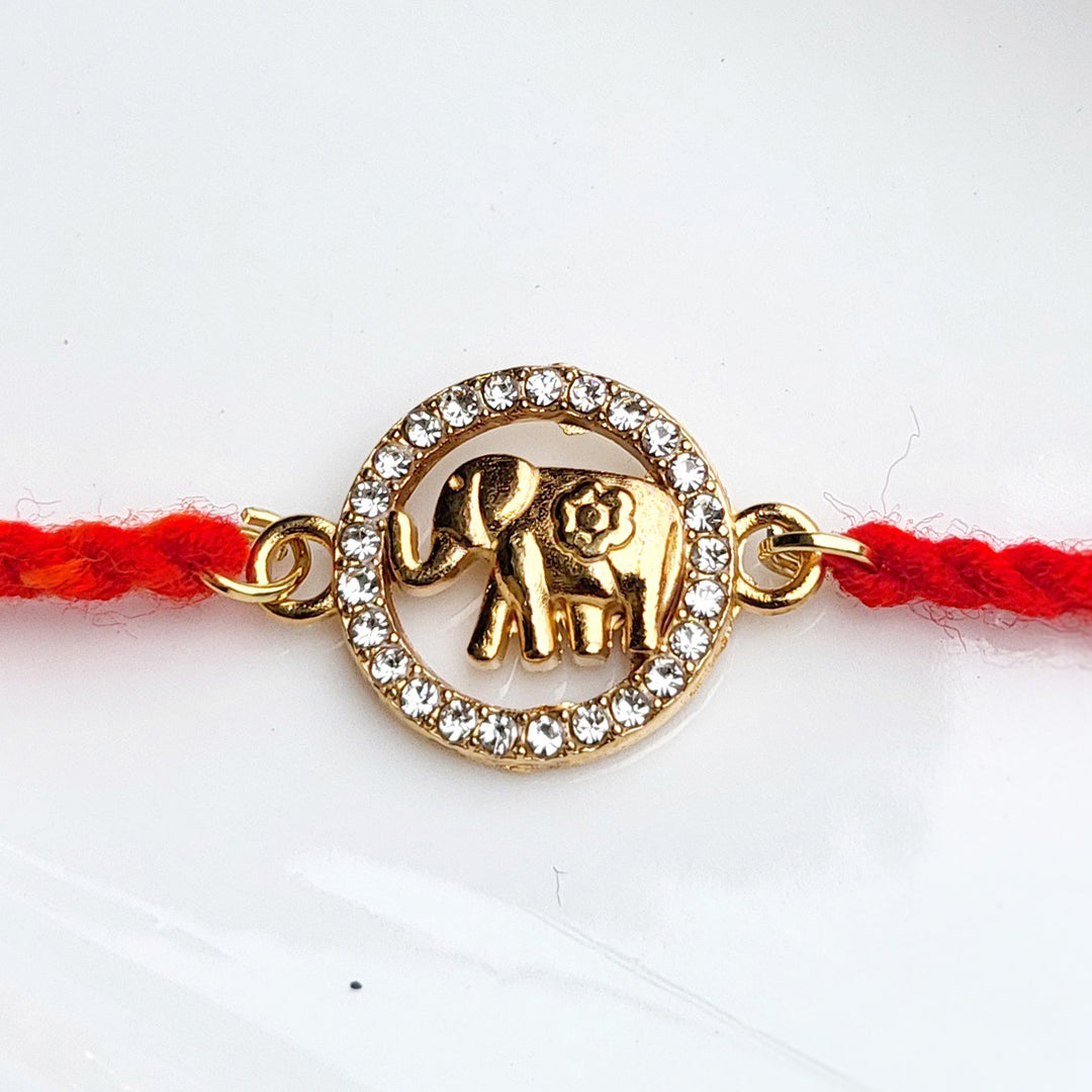 Handcrafted Brass-Cut Elephant Rakhi with Sparkling Stone Accents For Brother