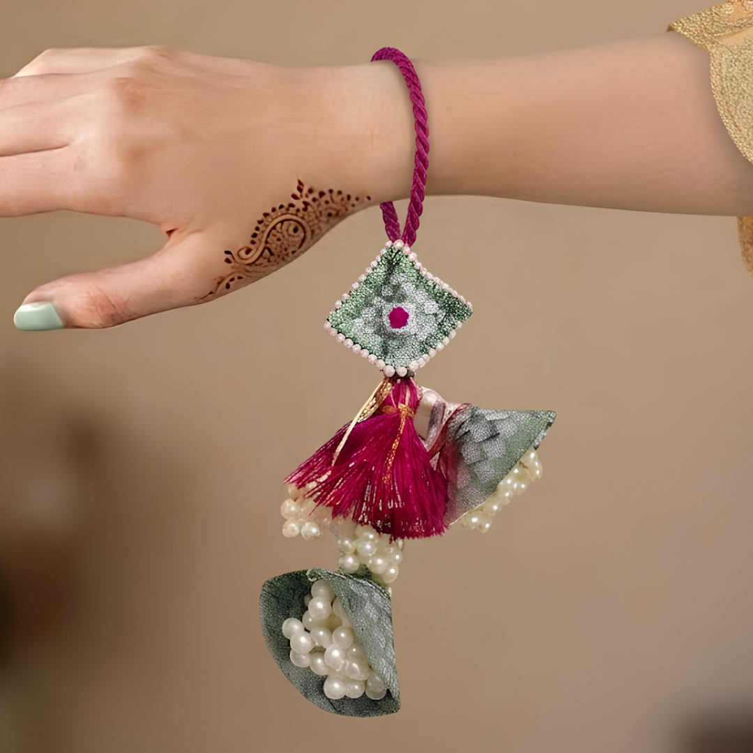 Handcrafted Pearl, Tassel & Thread Work Cheed Light Lumba Rakhi for Bhabhi - Mint Green