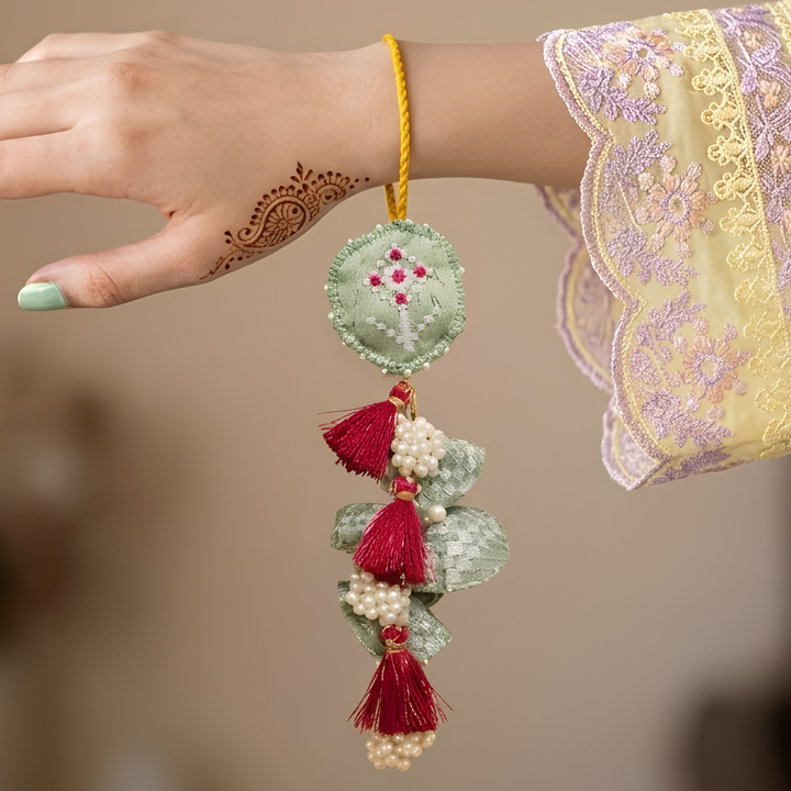 Handcrafted Pearl, Tassel & Thread Work Cheed Heavy Lumba Rakhi for Bhabhi - Mint Green
