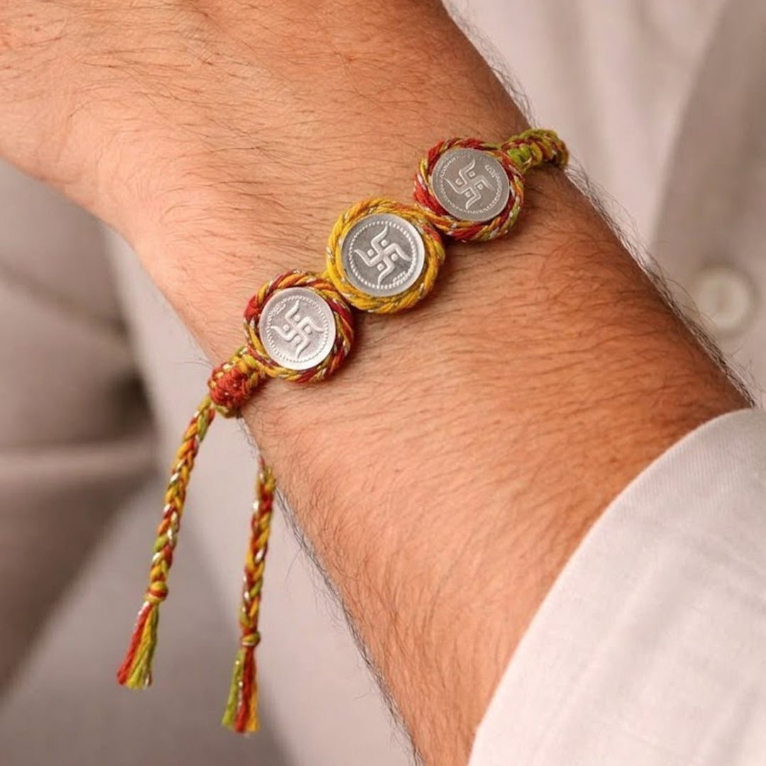 Handmade Three Swatik Coin Design Silver Rakhi With Roli Chawal For Bhaiya And Bhabhi