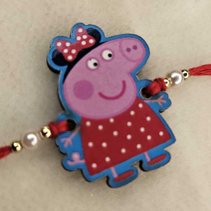 Handmade Peppa Pig Mdf Wood Kids Rakhi With Roli Chawal - Angled Side View of Girl Character