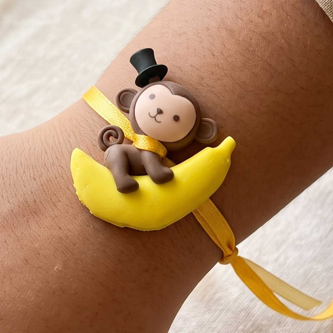 Engraved Little Monkey Rubber Charm Rakhi With Roli Chawal for Brother