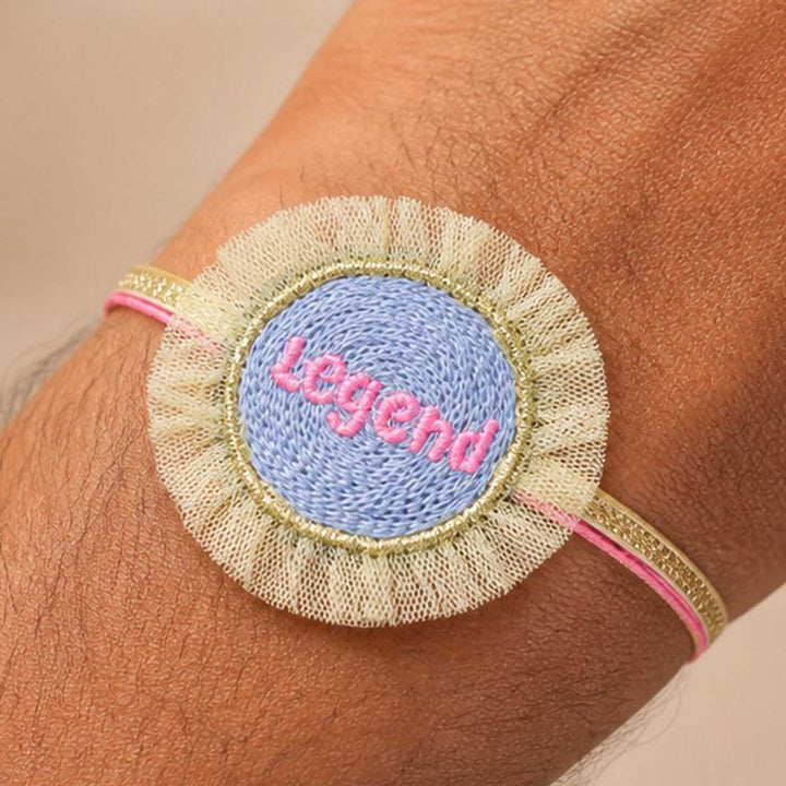 Handmade Thread Embroidered "Legend" Reusable Rakhi Magnet For Brother