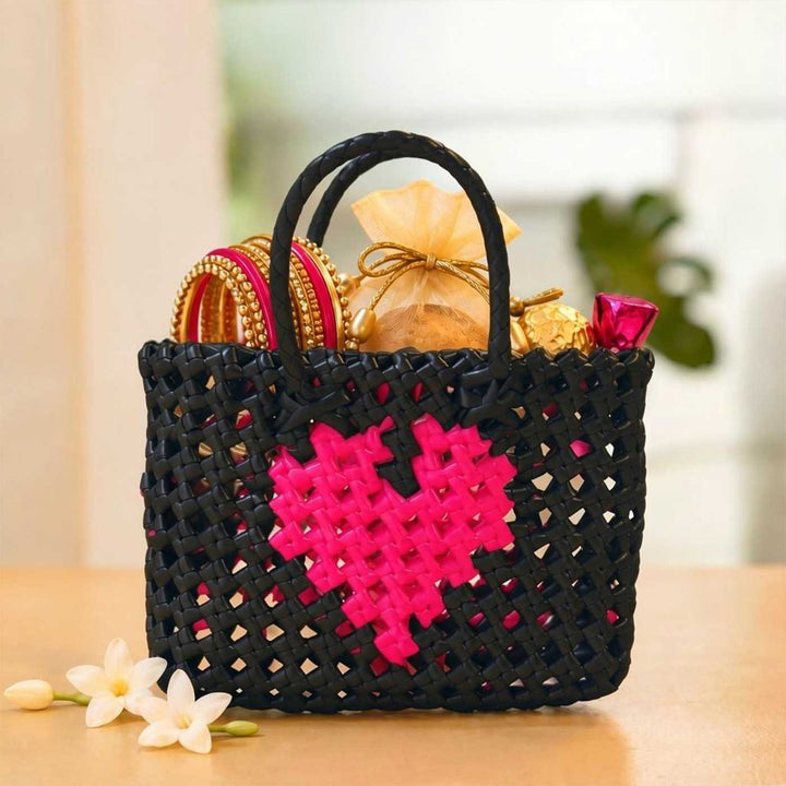 Handwoven Black Small Plastic Wire Koodai Bag With Pink Heart Motif For Festive Return Gifts