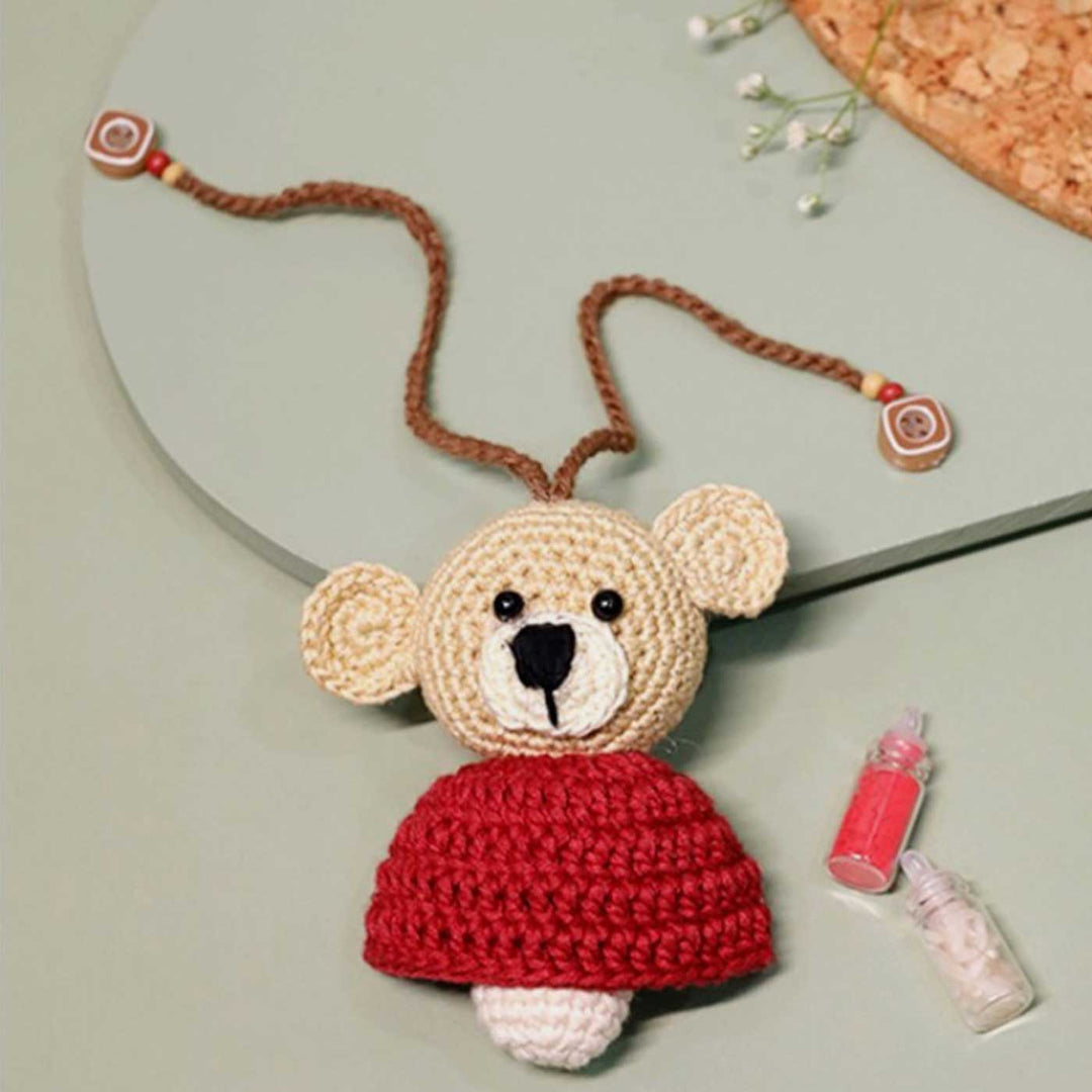 Handmade Crochet Teddy Hug Kids Lumba Rakhi With Roli Chawal - Front View with Accessories (2)