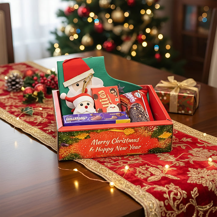 Personalized Christmas Gift Hamper | Includes 1 Ornament, 1 Stocking, 1 Santa Candle, 1 Brownie Cake, 1 Cadbury Chocobakes, 1 Nutties Pack