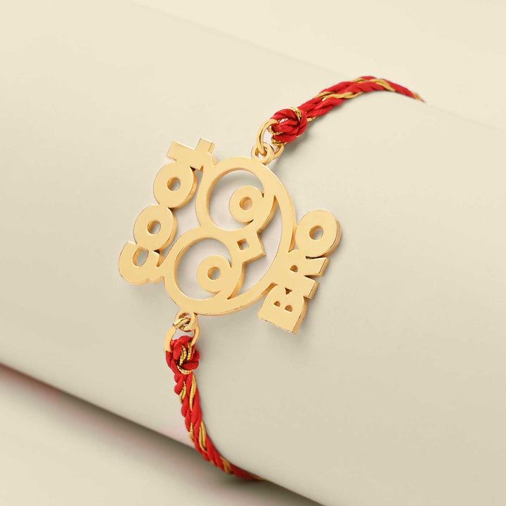 Handmade Cool Bro Design Metal Rakhi For Brother - Angled View Showing Charm and String