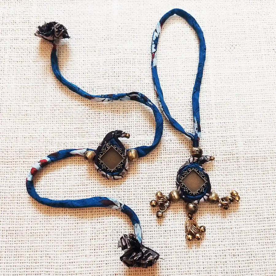 Handmade Dori Work Ambi Ajrakh Bhaiya Bhabhi Rakhi With Roli Chawal Set Of 2 - Two Bracelets Front View