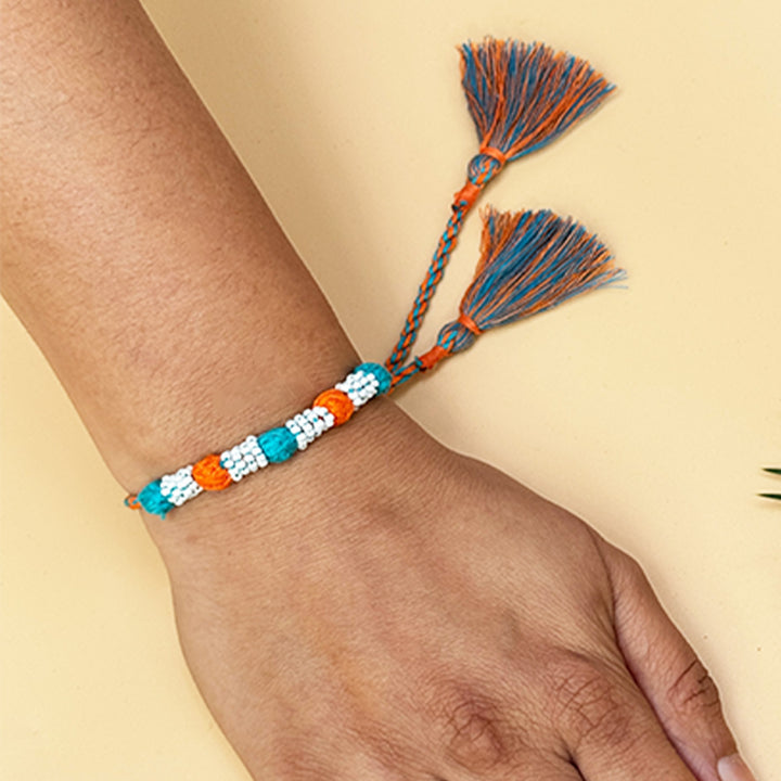 Handmade Reusable Orange And Blue Beaded Patwa Rakhi For Brother