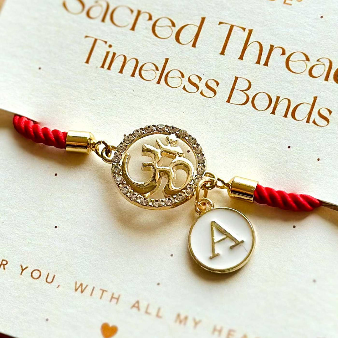 Personalized Handmade Om Design Monogram Metal Rakhi - Bracelet on Branded Message Card