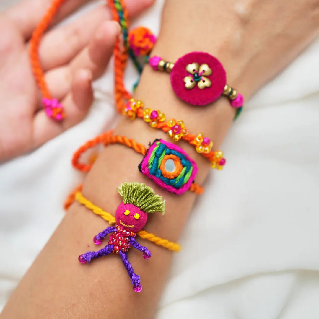 4 pc Rakhi + Brass Thali Set | Premium Tonu Monu Sonu Embroidered & Beaded Rakhi Set with Roli Chawal