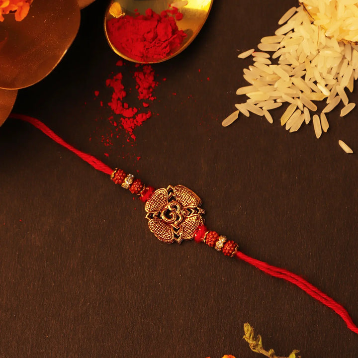Handmade Golden Om Rakhi With Roli Chawal