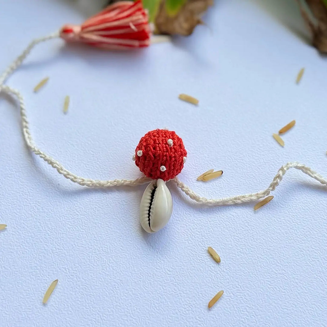 Handmade Crochet Cowrie Shell Rakhi With Roli Chawal