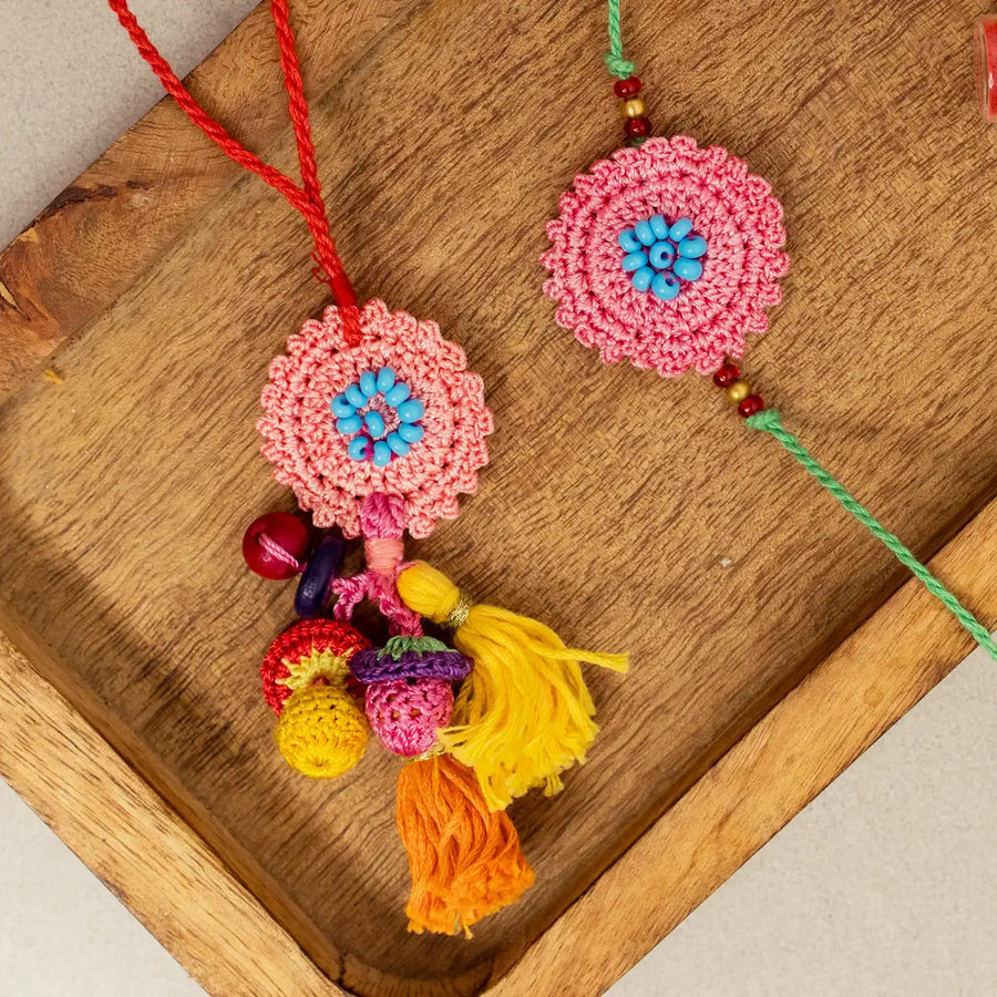 Handmade Crochet Pink Poppy Bhaiya Bhabhi Rakhi With Roli Chawal Set Of 2 - Close-up Showing Details