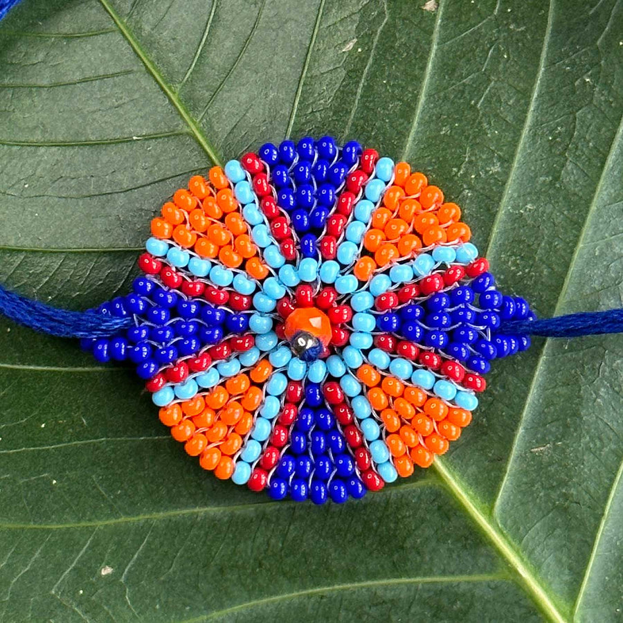 Customized Handmade Beaded Chakri Design Lumba Rakhi For Bhabhi With Roli Chawal - Close-up Beaded Bracelet Detail