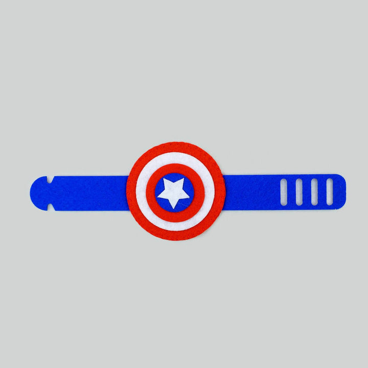 Kids Theme Felt Rakhi Band With Roli Chawal 3 - Flat lay on neutral background