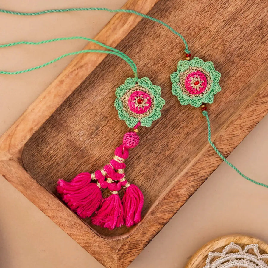Handmade Crochet Green And Pink Hariyali Bhaiya Bhabhi Rakhi With Roli Chawal Set Of 2 - Close-up Detail View