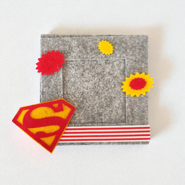 Photo Personalized Superman And Avengers Theme Felt Rakhi Hamper With Roli Chawal Includes 1 Magnetic Photo Frame 1 Rakhi - Front View of Felt Frame