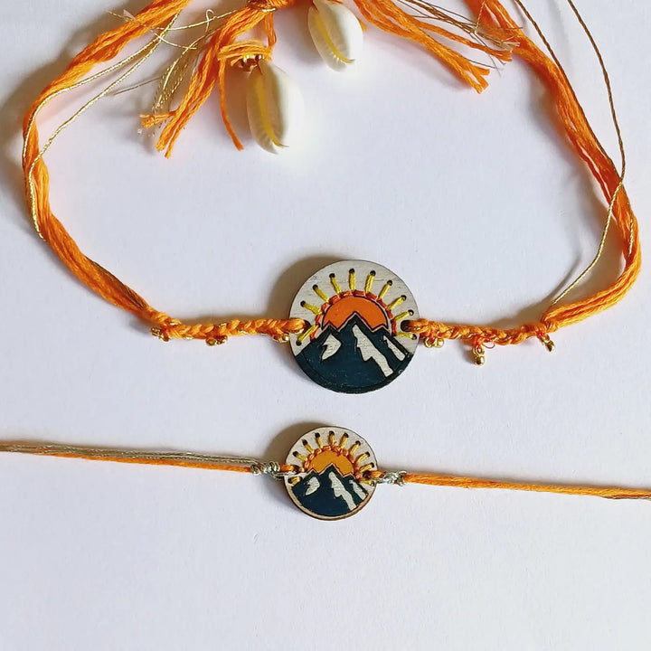 Handmade Mountain Sun Ghungroo & Shell Wooden Bhaiya Bhabhi Rakhi With Roli Chawal