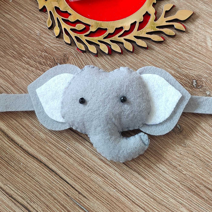 Handmade Elephant Theme Felt Kids Rakhi With Roli Chawal New - Close-up on Elephant Mask