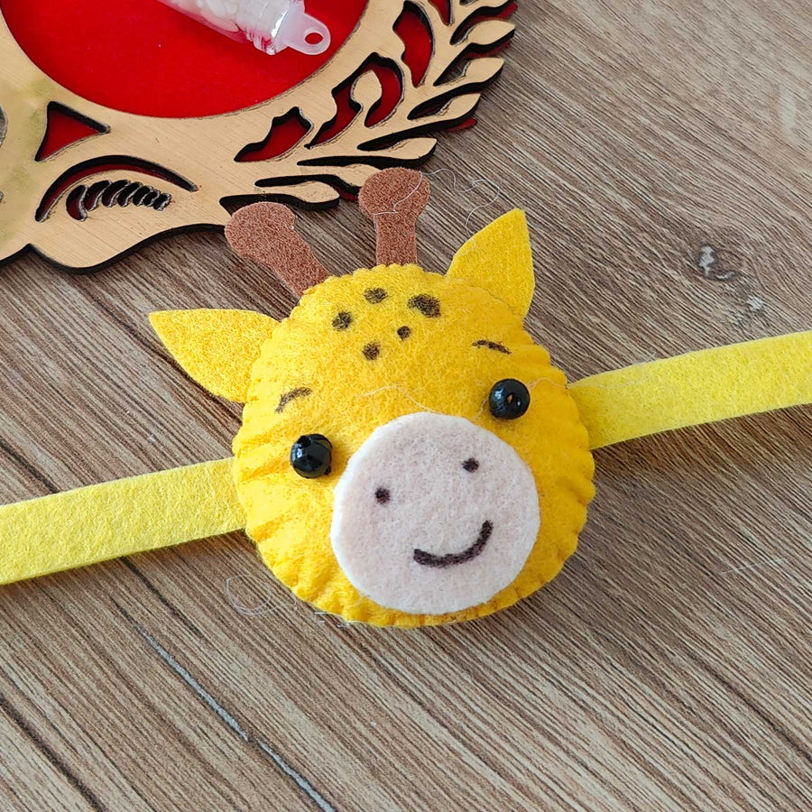 Handmade Giraffe Theme Felt Kids Rakhi With Roli Chawal New - Close-up Front View