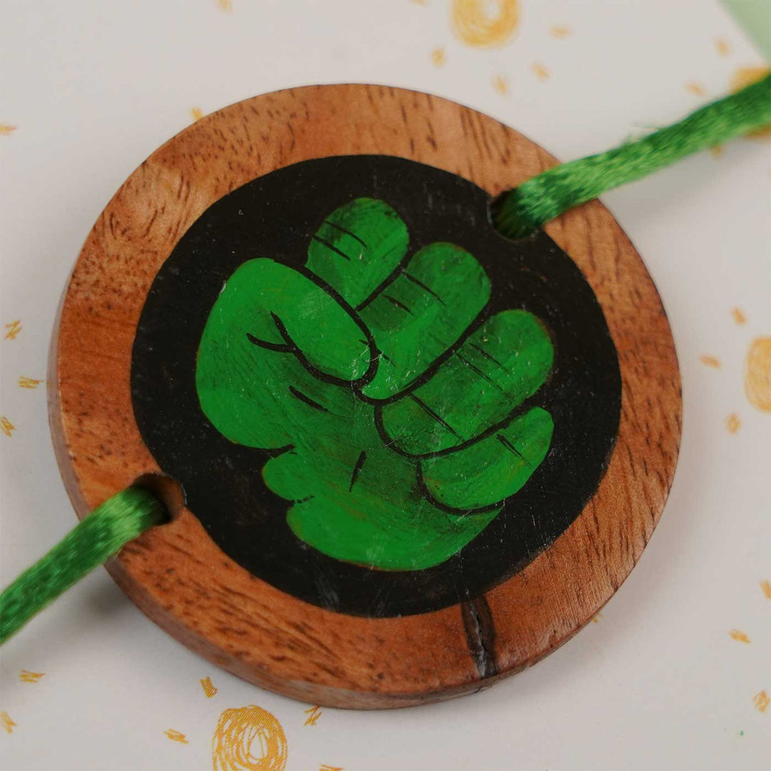 Personalized Hand Painted Hulk Theme Wooden Rakhi With Roli Chawal - Macro Detail of Wooden Pendant