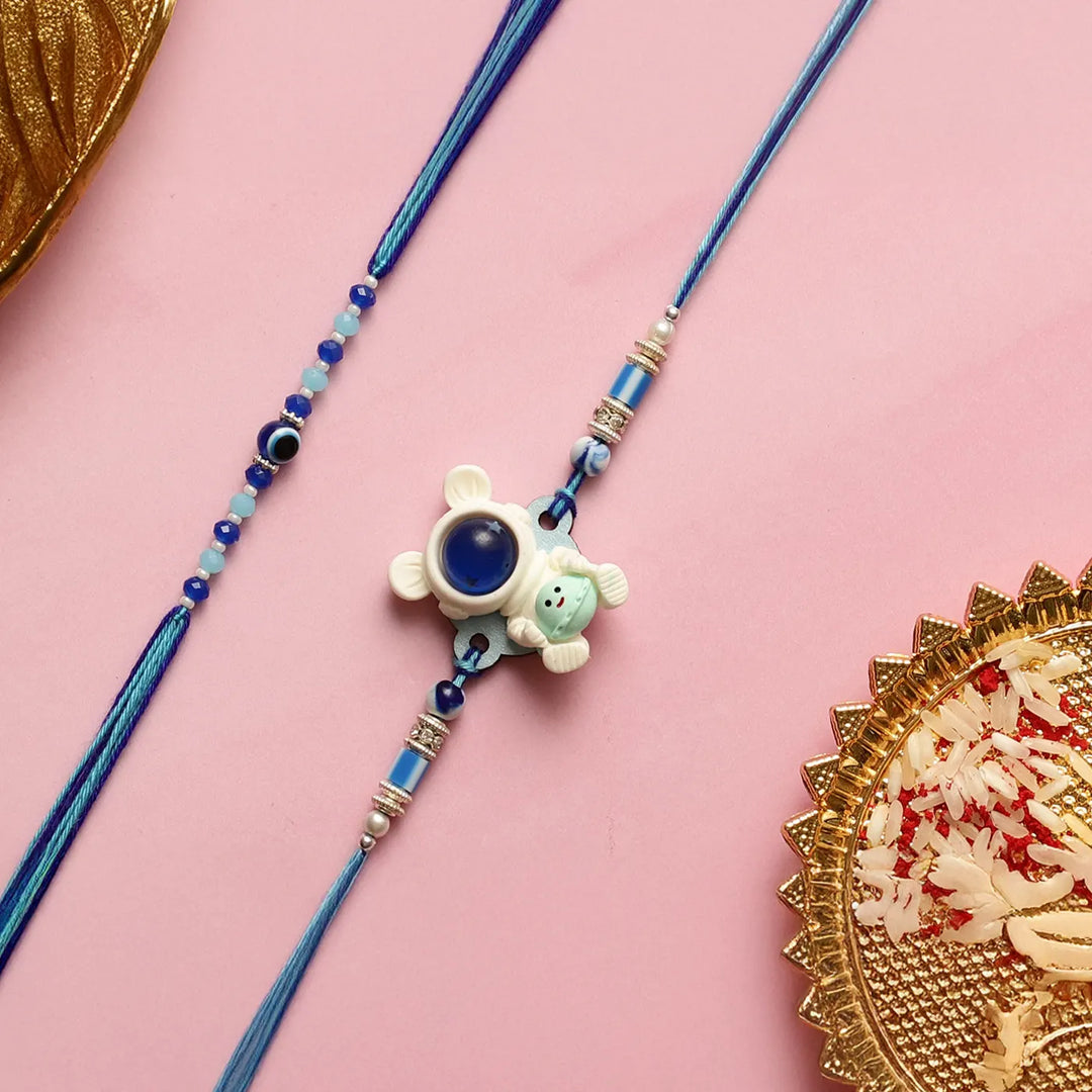 Handmade Astronaut & Evil Eye Kids Rakhi With Roli Chawal | Set Of 2