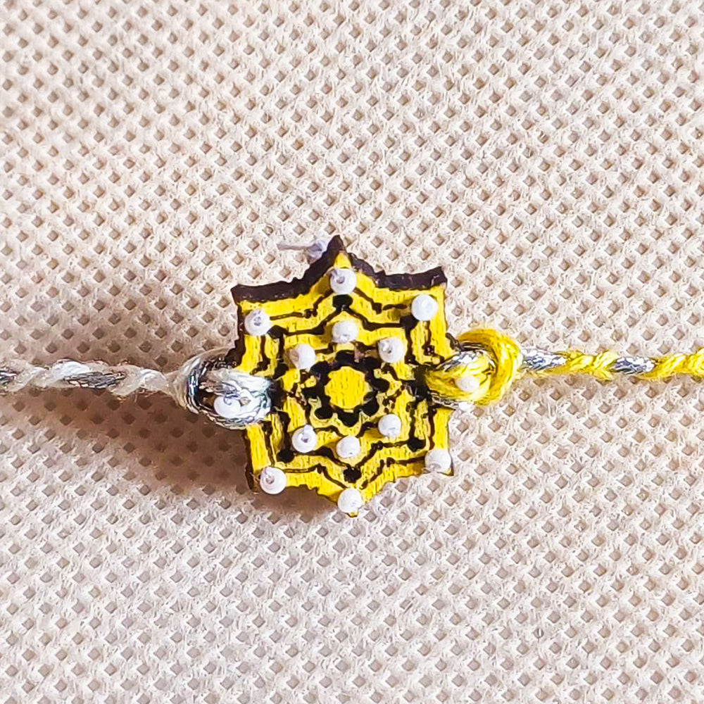 Handmade Yellow Star Shape Beads Wooden Rakhi With Roli Chawal For Brother - Close-up Detail View