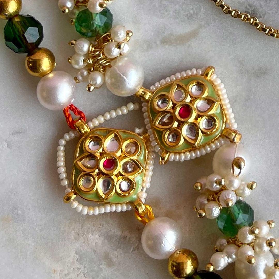 Handmade Golden Flower Design Metal Bhaiya Bhabhi Rakhi - Close-up of Ornament Details