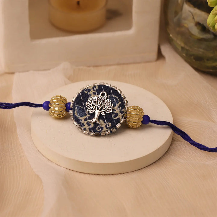 Handmade Blue Tree Of Life Rakhi With Roli Chawal