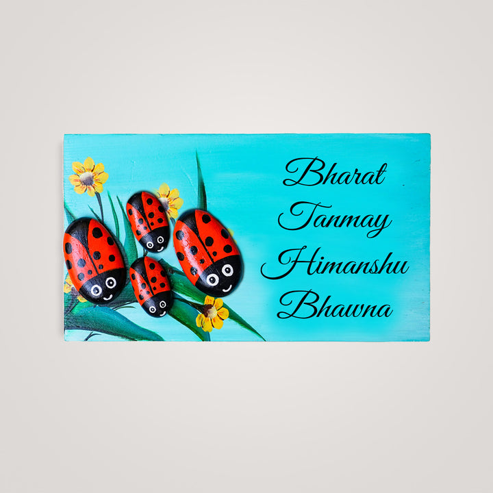 Hand-painted Ladybugs Pebble Nameboard