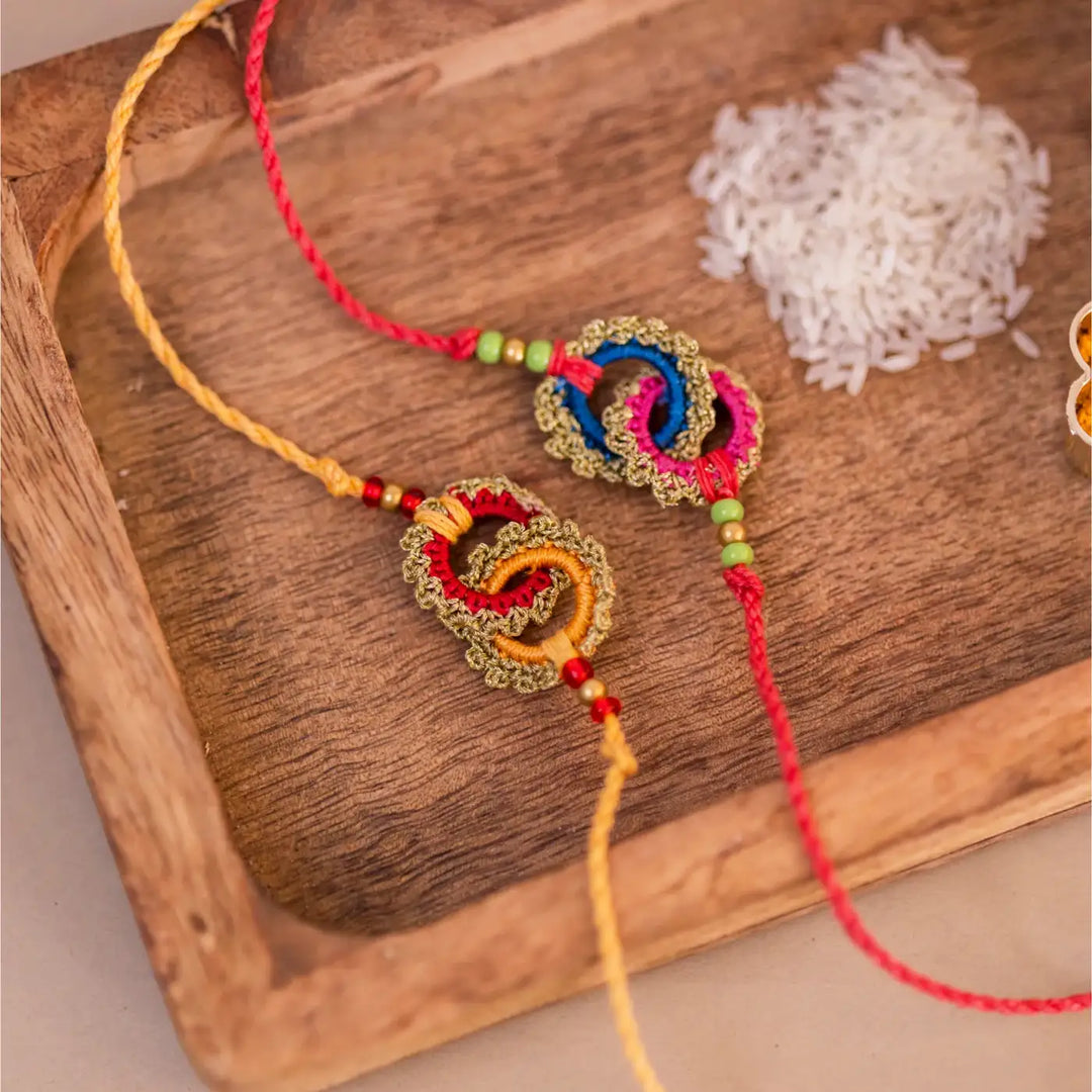 Handmade Crochet Bandhan Rakhi With Roli Chawal Set Of 2 - Close-up of Decorative Threads