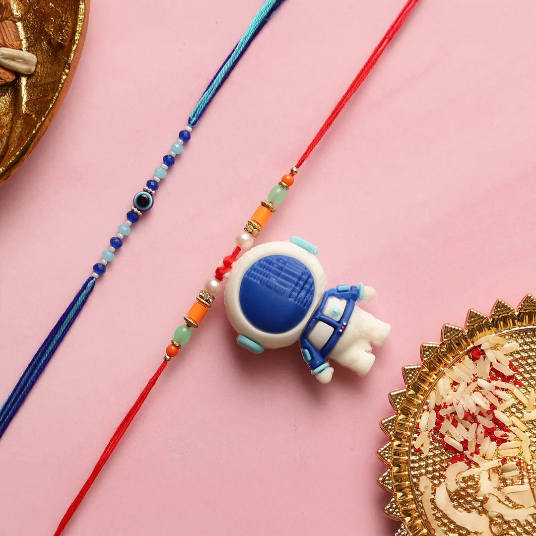 Handmade Astronaut & Evil Eye Kids Rakhi With Roli Chawal | Set Of 2