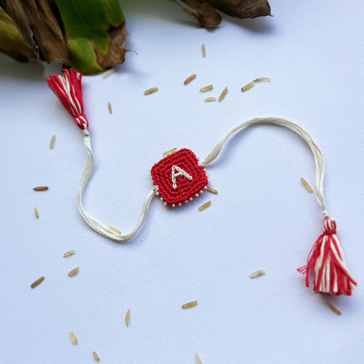 Personalized Handmade Crochet Red & White Initial Rakhi With Roli Chawal