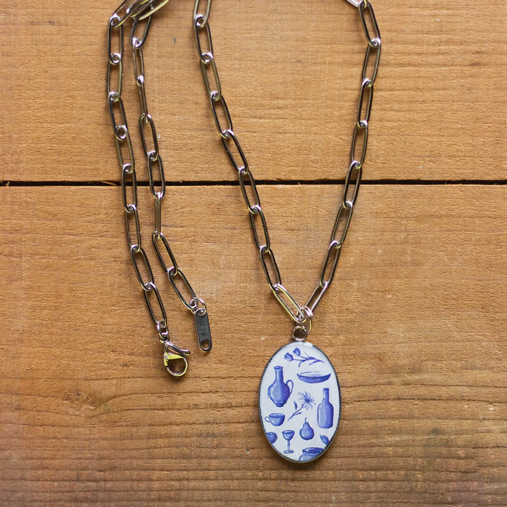 Illustrated White Ceramic Objects Inspired Resin & Stainless Steel Necklace