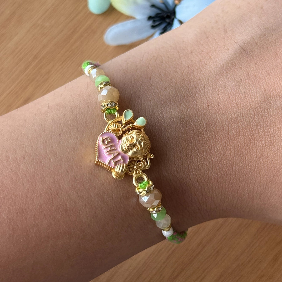 Handmade Beaded Bhai Rakhi With Roli Chawal 3 - Close-up on Wrist