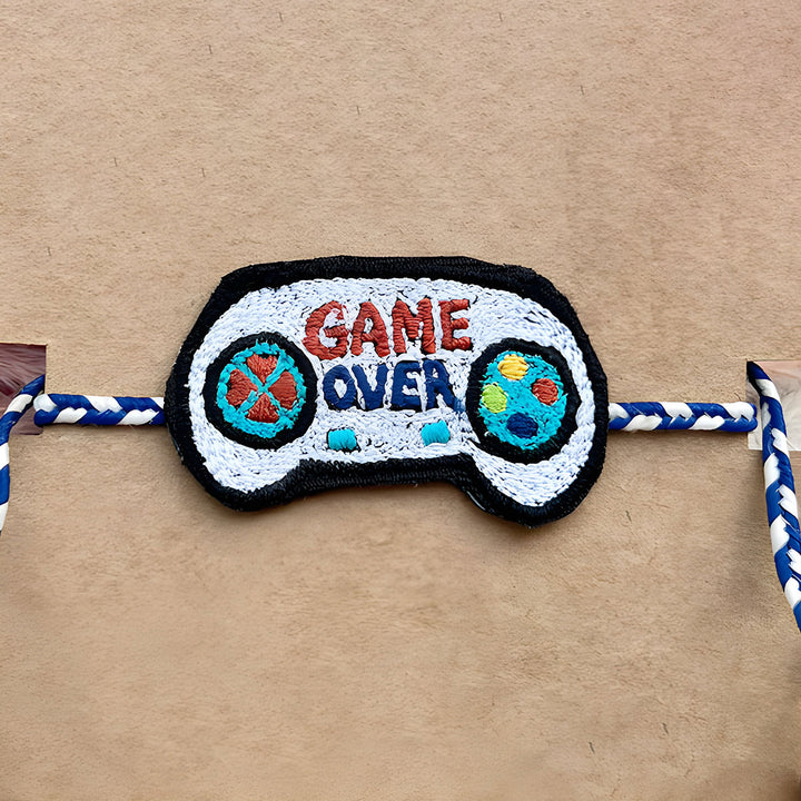 Handmade Reusable Game Over Pom Pom Felt Rakhi For Brother - Close-up Embroidery Detail