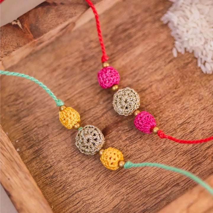 Handmade Crochet Teen Sitara Rakhi With Roli Chawal | Set Of 2