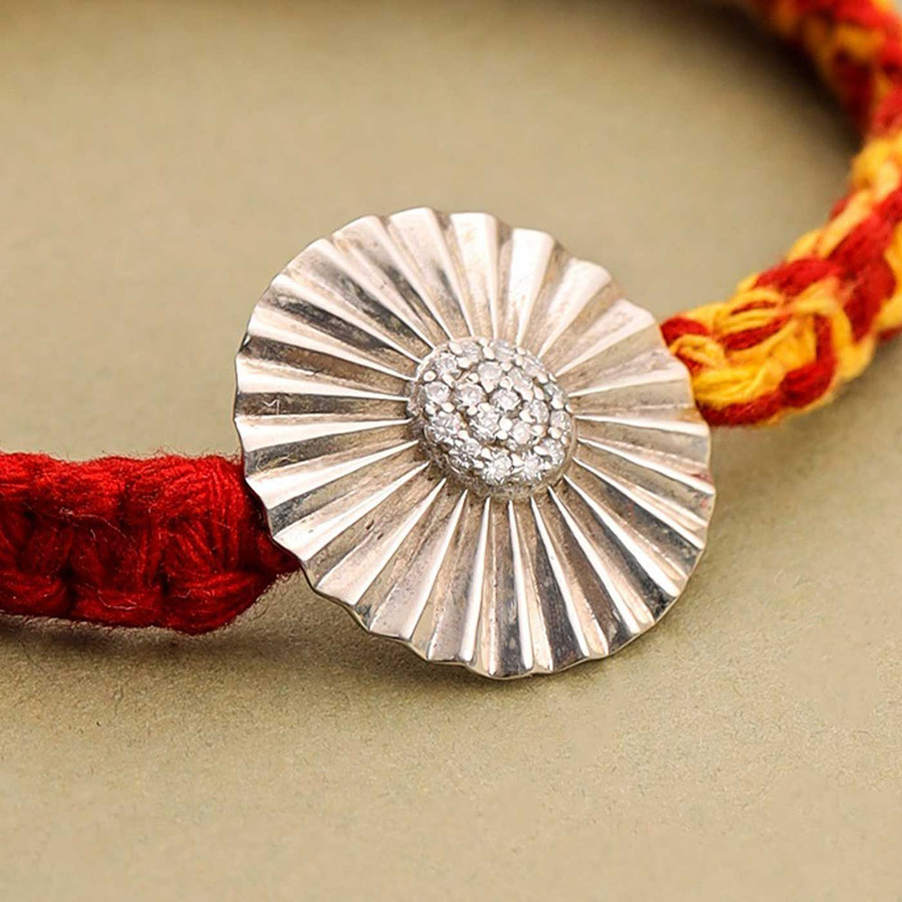 Handmade Sun Design Silver Rakhi For Brother - Close-up of Centerpiece